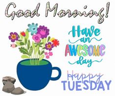 there is a cup with flowers in it and the words good morning have an awesome day