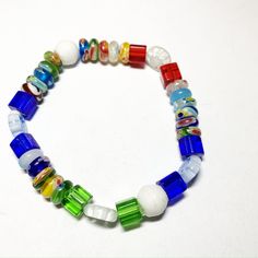 Colors of all kind on this fun and wacky stretch bracelet. Available in sizes 6 inches and 7 inches. Multicolor Flexible Stretch Bracelet For Friendship, Flexible Multicolor Stretch Bracelet For Friendship, Adjustable Multicolor Stretch Bracelet For Friendship, Playful Adjustable Multicolor Charm Bracelet, Casual Multicolor Beaded Wristband, Casual Rainbow Stretch Bracelet As Gift, Handmade Multicolor Flexible Stretch Bracelet, Flexible Multicolor Friendship Bracelets As Gift, Colorful Beaded Stretch Bracelet