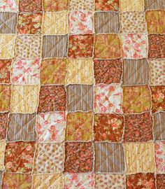 an old patchwork quilt with many different colors