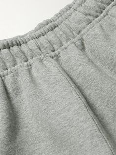 Nike's sweatpants are designed for everyday comfort and versatility. Updated with zipped pockets, they're cut for a neat taper from fleece-back cotton-blend jersey and have an elasticated drawstring waistband. Note the solo 'Swoosh' embroidered at the leg. Nike Collection, Sweatpants Nike, Sweatpants For Men, Nike Sweatpants, Nike Outfits, Drawstring Waistband, Mens Sweatpants, Mr Porter, Casual Pants