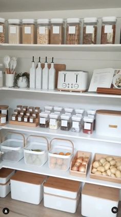 the shelves are filled with many different types of food and storage containers, including bread