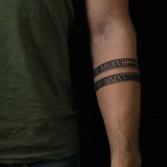 a man with a tattoo on his arm