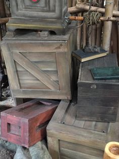 several wooden boxes stacked on top of each other