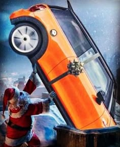 an orange car being held up by santa claus