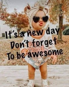 a baby wearing sunglasses and a hat with the words it's a new day don't forget to be awesome