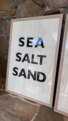 two framed posters with the words sea salt and sand printed on them next to each other