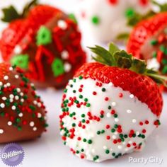 some chocolate covered strawberries with sprinkles on them