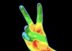 an image of a peace sign made out of colored paint on a black background with the word love written across it