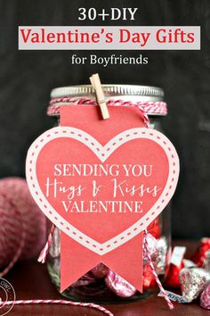 valentine's day gift in a jar with candy on the table and text overlay that reads 30 + diy valentine's day gifts for boyfriends