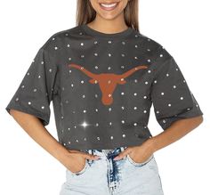 Design Short sleeve, crew-neck t-shirt Ribbed, tagless collar with interior taping Feminine fit Style and Team Spirit TEAM logo screen-printed at center chest Additional Details Machine washable Officially licensed product Crop Design, Gameday Couture, Crop T Shirt, Texas Longhorns, Crop Tshirt, Just In Time, Cotton Shorts, Team Logo, In Time