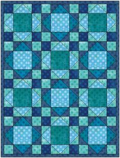 a blue and green quilt with squares on it