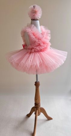 Introducing our Exquisite Salmon Tutu Dress for Kids and Babies - A Magical Fairy Dress Delight! Prepare for enchantment with our meticulously crafted Salmon Tutu Dress. Perfect for 1st-year birthdays, Halloween, festivals, special occasions, adorable toddler girl costumes, and as a stunning first birthday dress, this creation is a true showstopper. 👑 Unmatched Comfort: Soft Tutu on the outside, cotton lining on the inside. No itching or irritation, just pure comfort for your little fairy. 🌟 Tailored Perfection: Fully customizable for a perfect fit. Adjustable straps and elastic waist ensure your baby girl feels comfortable and looks amazing. 💖 Superior Craftsmanship: Sewn with love, this fairy dress stands out from the crowd. ✨ Unveiling the Extraordinary: 1️⃣ Premium Quality: Finest f Whimsical Princess Dress With Ruffles For Dress-up, Playful Ruffled Tutu Dress, Playful Ruffled Tutu Dress In Tulle, Playful Ruffled Tulle Tutu Dress, Whimsical Tutu Dress For Easter Dress-up, Playful Ruffled Tutu Dress For Dress-up, Playful Tulle Fairy Dress With Ruffles, Fairytale Party Dress With Ruffles, Playful Pink Ruffled Fairy Dress