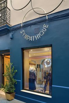 a blue store front with the words southgate written on it's window display