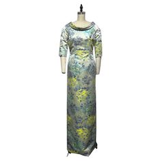 Palest blue floral jacquard column gown, with 3/4 sleeve, graceful neckline and lovely floral French jacquard fabric in shades of blue and chartreuse, creating timeless elegance. Ideal for formal occasions like black-tie galas, weddings, and celebrations - whether you're the mother of the bride or groom, or a distinguished guest. A timeless piece suitable for any season, this exquisite dress will remain a cherished part of your wardrobe for years to come. Timeless Chic that can be worn year roun Gold Brocade Dress, Jacquard Gown, Shades Of Blue And Green, Skull Dress, Timeless Chic, Black Tie Gala, Perfect Little Black Dress, 1980s Dresses, Column Gown