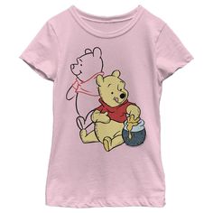 Take a stroll with Christopher Robin through Hundred Acre Woods in this officially licensed Disney Winnie the Pooh Honey and Happiness Tee! This adorable Girls' design features a happy Winnie the Pooh with his paw in a delicious, gooey honey pot. You will love this tee almost as much a Winnie the Pooh loves his honey! Winnie The Pooh Honey, Happy Tshirt, Hundred Acre Woods, Christopher Robin, Tops Graphic, Sleeves Style, Girls Graphic Tee, Sleeve Packaging, Pooh Bear