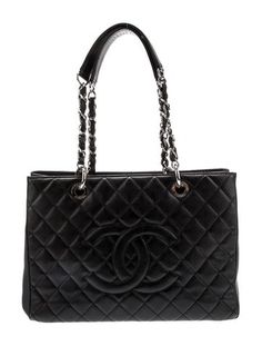 Chanel ToteFrom the 2014 Collection by Karl LagerfeldBlackInterlocking CC Logo, Caviar Leather, Quilted Pattern & Chain-Link AccentSilver-Tone HardwareChain-Link Shoulder StrapsChain-Link Accents & Single Exterior PocketSatin Lining & Three Interior PocketsOpen TopIncludes Dust Bag Chanel Tote, Quilted Pattern, Chanel Caviar, Cc Logo, Shopping Tote, Tote Handbags, Chain Link, Quilt Patterns, Dust Bag