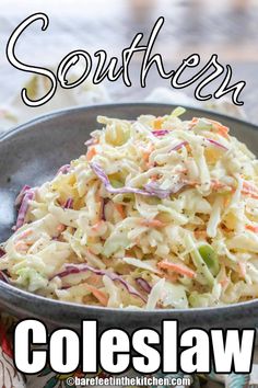 a bowl filled with coleslaw slaw on top of a table