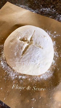 flour and score on a piece of parchment paper