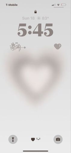 an iphone screen showing the time and date for valentine's day, with hearts on it