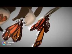 three monarch butterflies hanging from the ceiling