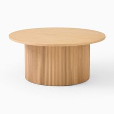 a round wooden table with wavy lines on the top and bottom, against a white background