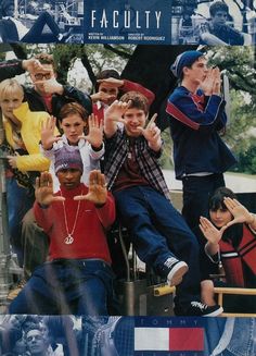 a group of young people standing next to each other