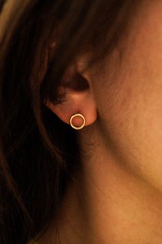 These earrings are simple, modern and beautiful. Try pairing them with the Twist Open Circle Studs! Choose a PAIR of studs or a SINGLE stud at checkout. The REGULAR size measures around 1/4″ in diameter.Each stud earring comes with an ear nut backing. Choose from 14K GOLD FILL, 14K ROSE GOLD FILL, or STERLING SILVER. Each Open Circle stud earring is individually shaped by hand for a beautiful hand-crafted, high-quality earring. First, we solder a small circle to an ear wire post. Then we polish Circle Stud Earrings, Flat Back Earrings, Symbolic Jewelry, Small Circle, Circle Earrings Studs, Travel Jewelry Case, Circle Studs, Chain Choker, Stud Earring