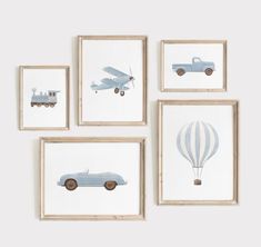 four framed pictures with cars and hot air balloons hanging on the wall in front of them