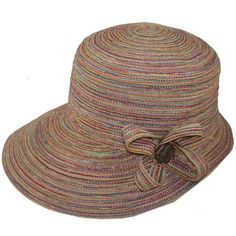 a woman's hat with a bow on the front and side, in multicolored stripes