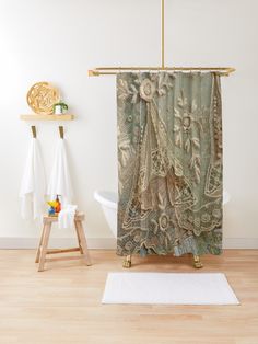 a bathroom with a shower curtain and rug