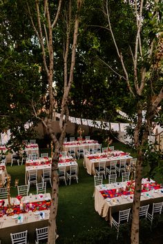 tables and chairs are set up for an outdoor party