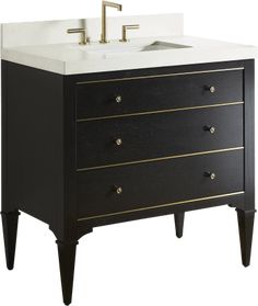 a black and white bathroom vanity with gold trimmings on the drawers, two faucets in front of it