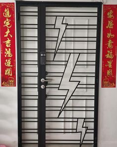 an open door with chinese writing on it