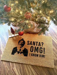 a door mat that says santa? omg i know him under a christmas tree