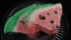 watermelon and ice cream treat with yogurt on top in a bowl