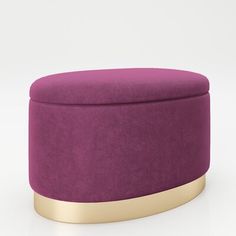 a purple ottoman with gold trim around it