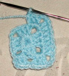 the crochet square is being worked on