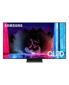 the samsung qled tv is shown with an image of a woman surfing on it