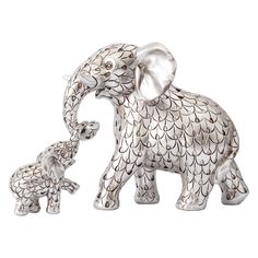 an elephant figurine with its baby