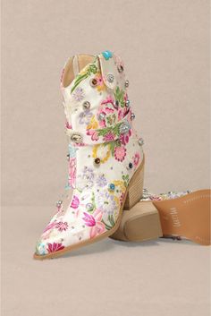 Step out in style with these Florence Floral Rhinestone Embellished Cowgirl Boots! The beautiful floral design and sparkly rhinestone embellishments add a touch of whimsy to any outfit. These boots are sure to make a statement and turn heads wherever you go. Perfect for the fashion-forward cowgirl. Yee-haw! Floral Brocade Rhinestone Embellishments Side Zipper Block Heel Brocade Designs, Mid Boots, Western Booties, Rhinestone Embellishments, New Arrival Dress, Cowgirl Boots, Shoes Heels Boots, Shoe Brands, Shoes Women Heels