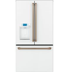 a white refrigerator freezer with gold trimmings and an ice maker on the door