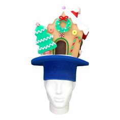 "Get this Awesome Christmas Gingerbread House Hat Today! This Christmas Gingerbread House Hat will definitely make you stand out at your next Party, Wedding, Corporate Event, Birthday, Quinceanera, or Halloween Party!  Product Details: ✓Made in the USA ✓Handmade ✓High Quality Foam ✓One Size Fits Most ✓Customizable to your preferences \"This is where your party starts\". Give your next party a new life and rediscover your youth with Foam Party Hats. Foam Party Hats Guarantee At Foam Party Hats we believe our hats help bring a new joy and excitement to the traditional party. Our products are made with love in Houston, Texas. We understand that buying things online can be scary with companies not staying true to their customers so we go the extra mile to keep you satisfied. If you bought some Christmas Headwear, Christmas Bride, Gingerbread Party, Bread Man, Foam Party, Christmas Craft Fair, Bride Hat, Christmas Gingerbread House, Top Hats