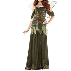 a woman in a green dress with a fairy wings on her head and long red hair