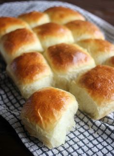 several pieces of bread sitting on top of a towel