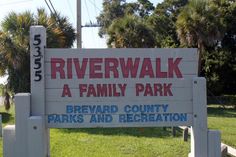 a sign for riverwalk at family park