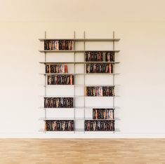 Wall Mounted DVD Storage Shelving Blu Ray Storage, Blu Ray Collection, Minimize Clutter, Dwell Magazine, Dvd Storage, Deep Shelves, Storage Shelving, Frame Shelf, Modern Shelving