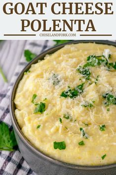 a bowl filled with cheese and parsley on top of a checkered table cloth