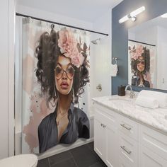 a bathroom with a large shower curtain featuring a woman's face and flowers in her hair