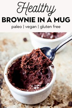 a spoon full of brownie in a mug with the title above it that reads healthy brownie in a mug pale vegan gluten free