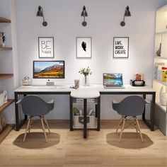 two desks with chairs and pictures on the wall in an office space that is well lit